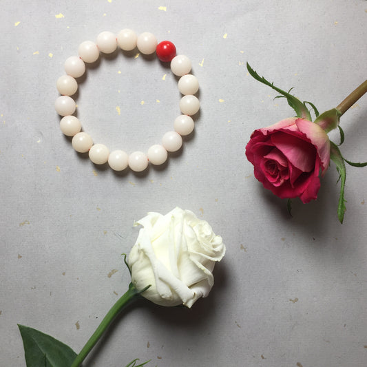 Creamy White Bodhi Seed Mala Bracelet with Red Cinnabar Bead.