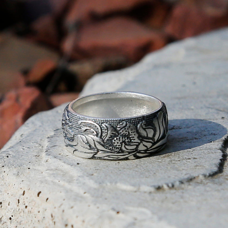 A hand-engraved silver ring with a leaf motif - Carol Clift Jewellery