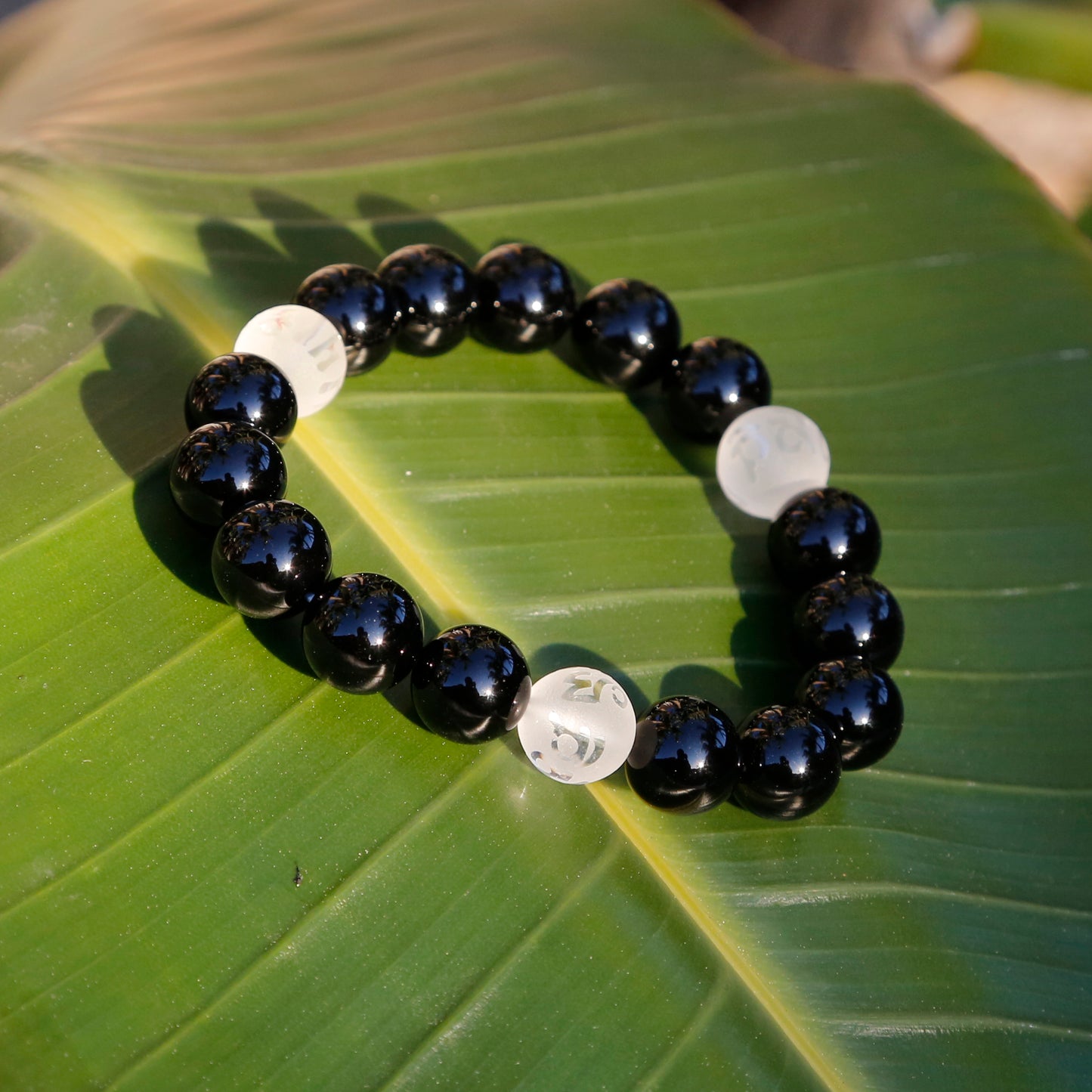 Black and White Tibetan Buddhist Prayers Symbols Beaded Bracelet, Black Onyx and Quartz Mala - ZentralDesigns